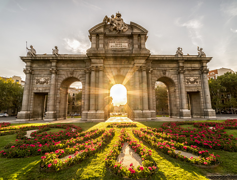 Sunset over the famous Puerta de Alcala Arch of Madrid, Spain