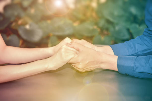istock Couples are shaking hands in the park with morning light. 903519016