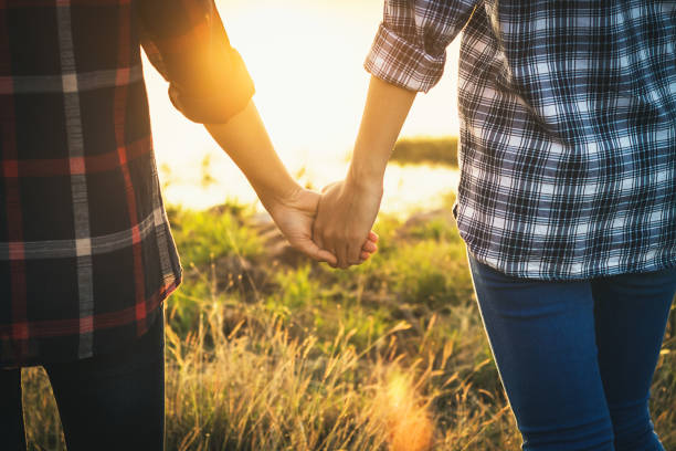 istock lover hold hands each other with love. 903520148
