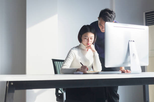istock young freelancer couple working together at home office 903523294