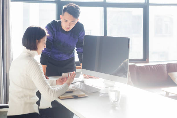 istock young freelancer couple working together at home office 903525800