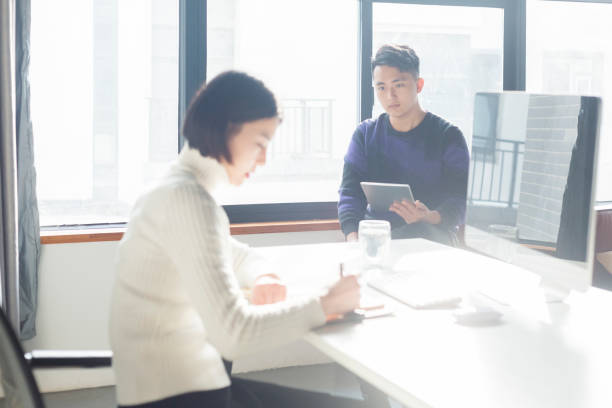istock young freelancer couple working together at home office 903526834