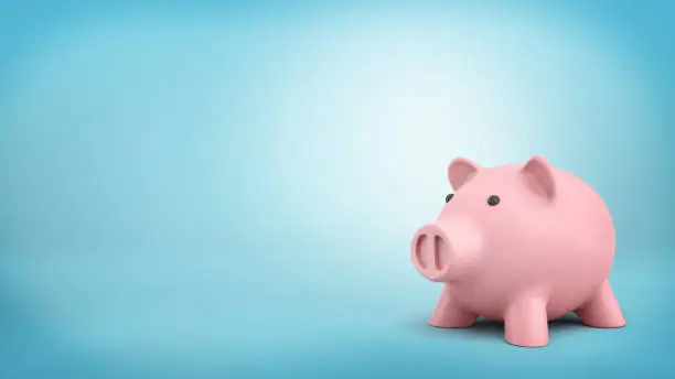 Photo of 3d rendering of a pink ceramic piggy bank isolated on blue background