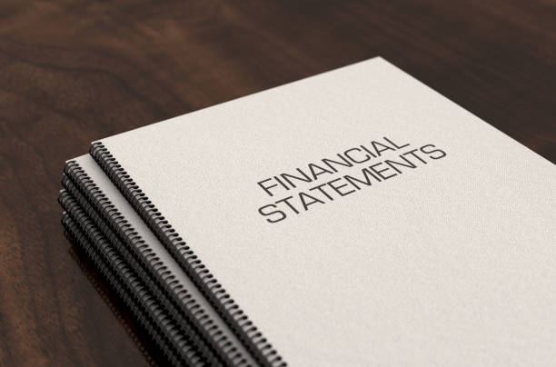 Bound Booklet Pile A pile of wire bound financial statement documents in a pile on a boardroom table surface - 3D render financial statement stock pictures, royalty-free photos & images