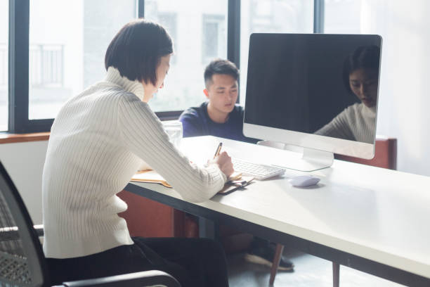 istock young freelancer couple working together at home office 903540978