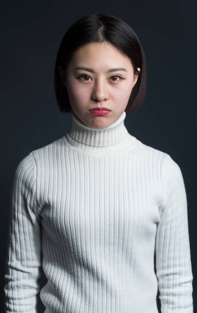 istock young asian female puckering,portrait 903541620