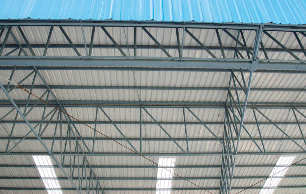 istock metal roofing on commercial construction 903556432