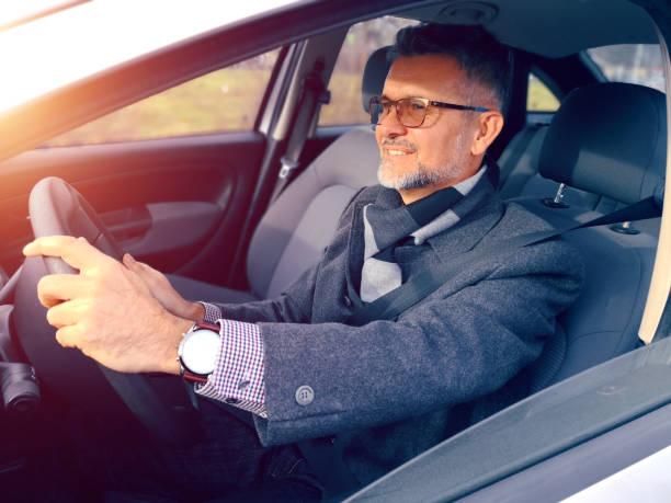 istock Businessman driving a car 903561924