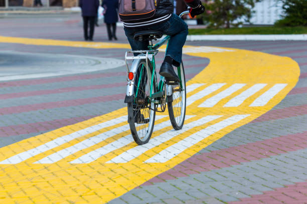 istock A man on a bicycle is driving along a bicycle path 903567834