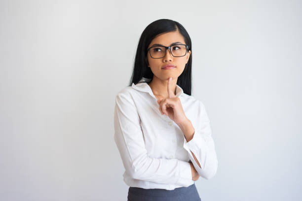 istock Pensive Nice Young Business Lady Touching Chin 903578880