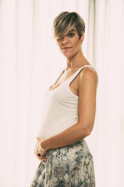 istock Serious pregnant woman touching her belly 903583992