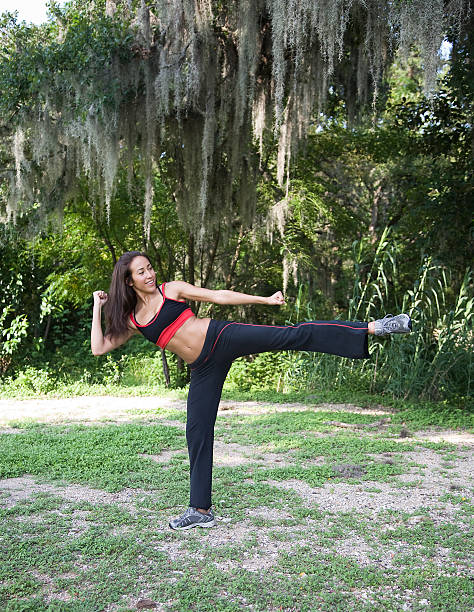 woman kick boxing stock photo