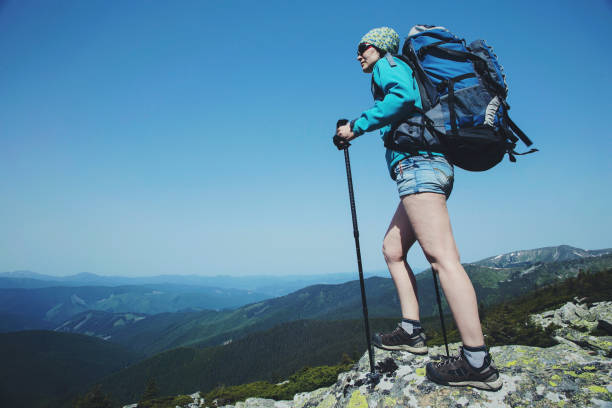 istock Summer hike in the mountains with a backpack and tent. 903589810