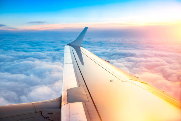 istock Flying above the clouds. Aerial view from the airplane wing 903594474