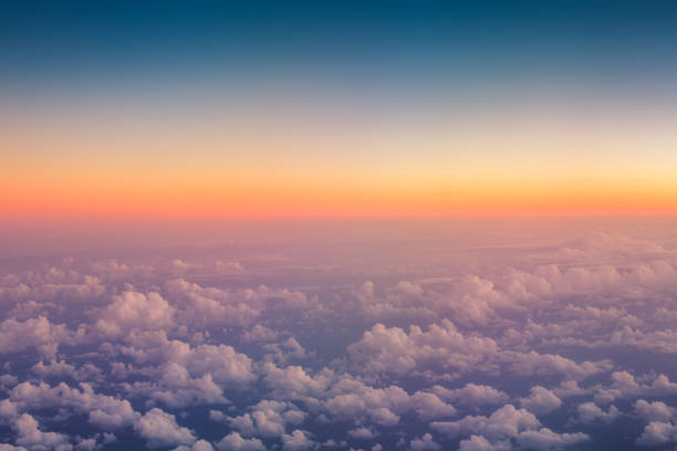 istock Flying above the clouds. Top view from the airplane 903596122