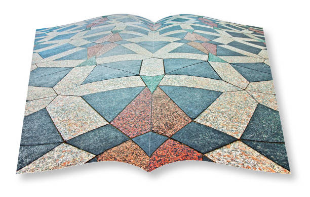 Opened photo book isolated on white background with the detail of the colored stone paving of the abrió foto libro aislado sobre fondo blanco con el detalle de la pavimentación de piedra color de