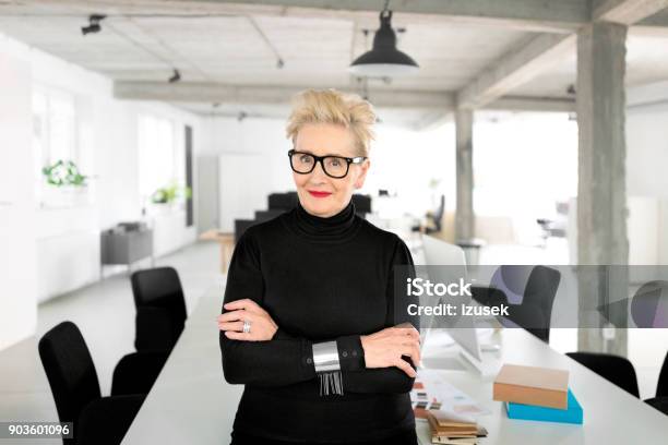 Confident Senior Businesswoman In The Studio Stock Photo - Download Image Now - Smiling, Business Person, Confidence