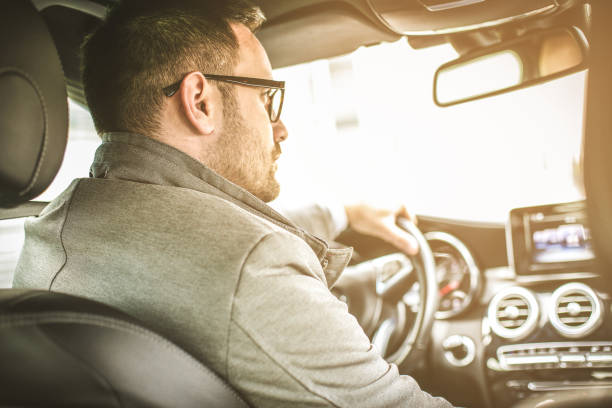 istock Business man in his car. 903602554