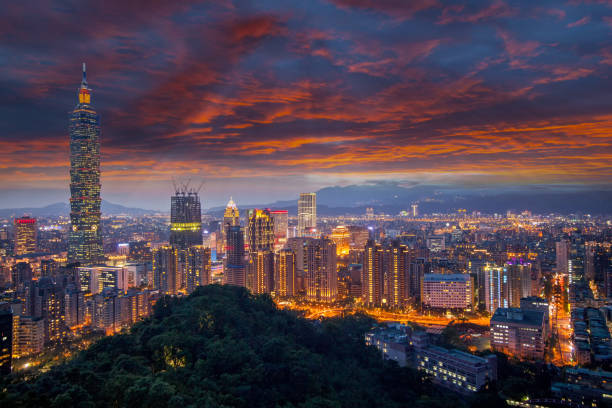 istock Taipei 101 towers over the Xinyi District at twilight 903607480