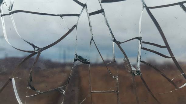 istock The cracked glass. Broken glass. Abstract background 903609348