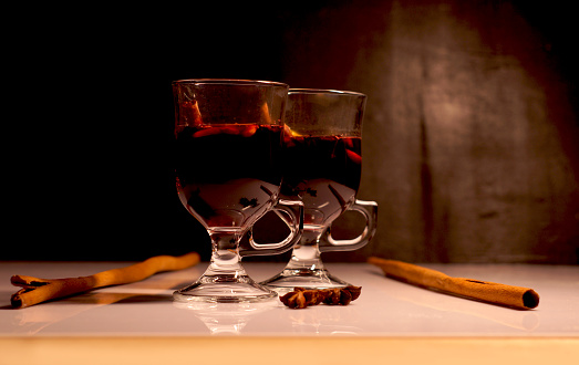 Winter mulled wine for two people Christmas mulled wine. Holiday concept decorated with  branches
