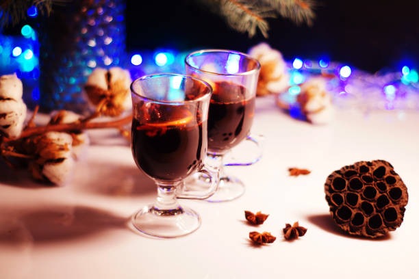 Winter mulled wine for two people Christmas mulled wine. Holiday concept decorated with  branches