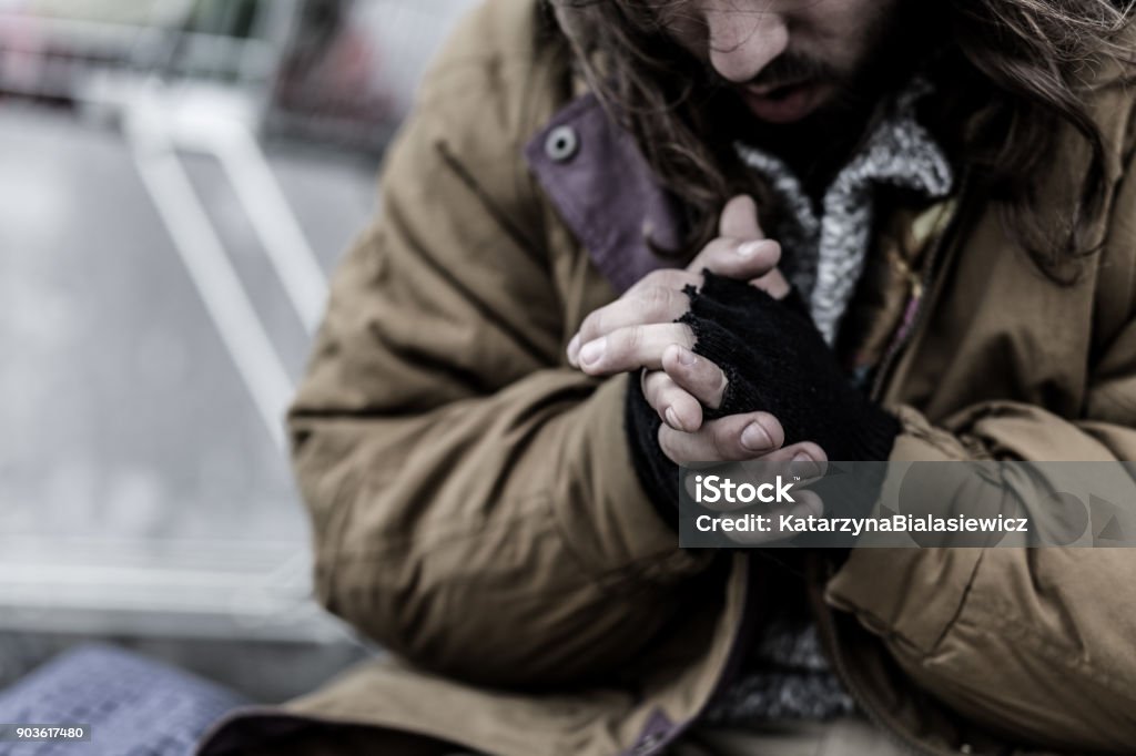 Close-up of dirty beggar's hands Close-up of dirty hands of beggar. Problems of homeless person in the city concept Homelessness Stock Photo