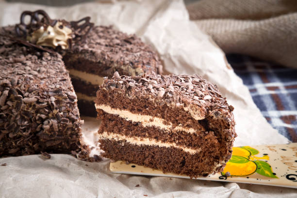 istock sponge cake with butter cream and sprinkled with chocolate 903625286
