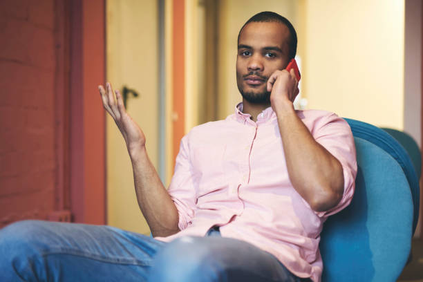 istock Concentrated professional male journalist having serious conversation with chief about publication, confident good looking student of university talking with groupmates about coursework indoors 903626188
