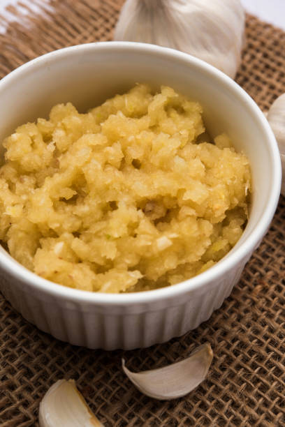 istock Garlic Paste or Toum or Toumya with raw garlic, isolated over white backgroundGinger/Garlic Powder 903632526