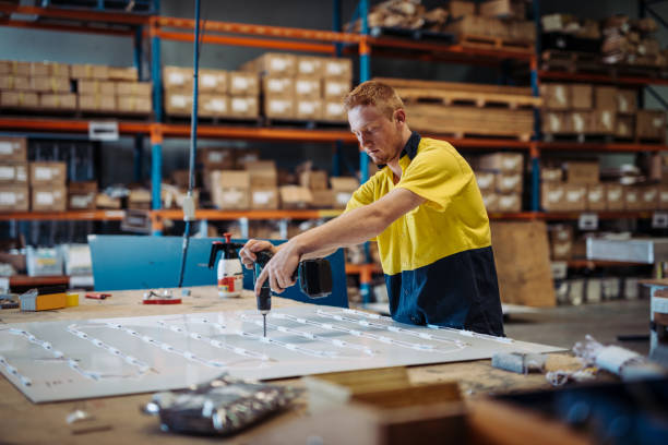 istock Ginger Australian guy working in packaging factory 903641076