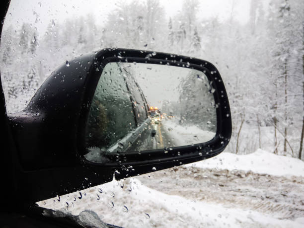 istock An exterior mirror of a car in winter 903642696