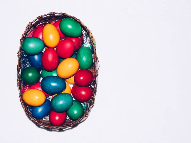 istock Colorful easter eggs in basket. Happy Easter, Christian religious holiday. 903650486