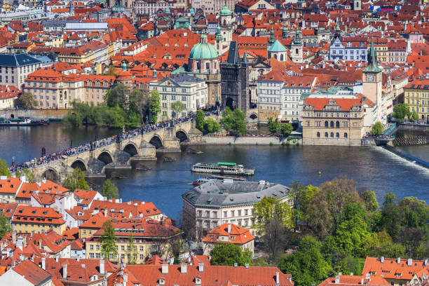 istock Charles Bridge (a.k.a. Karluv most, Stone Bridge, Kamenny most, Prague Bridge, Prazhski most) over Vltava river in Prague, Czech Republic. 903650522