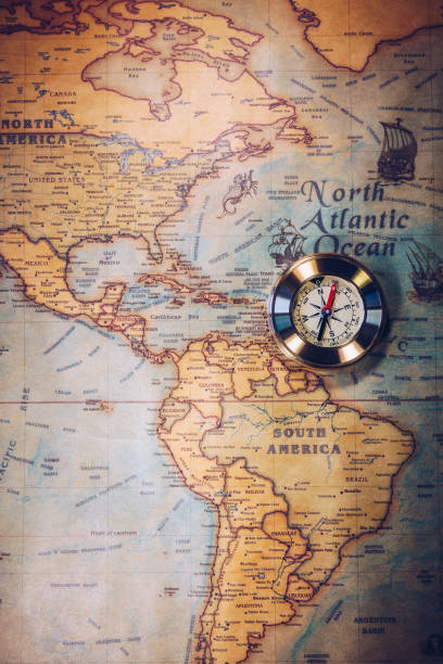 istock Columbus day and world map with compass 903650660