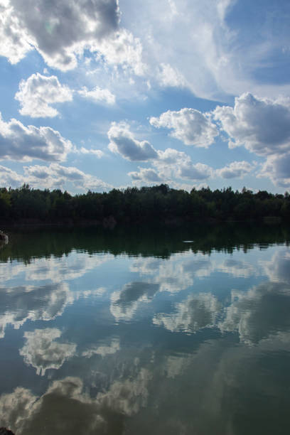 istock Lake in Woods. Pure lake in the forest. Beautiful sky. Reflection 903650722