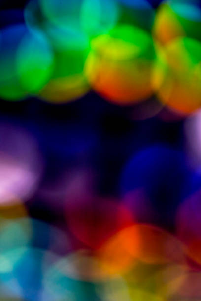 istock Crystal Bokeh Rainbow Vibrant Abstract Circles Background 903653322