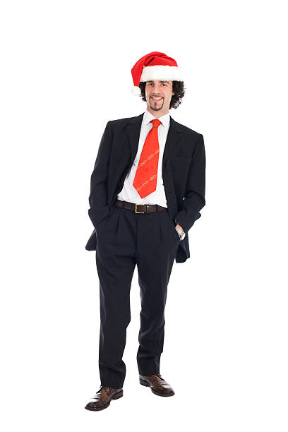 istock young businessman with santa hat isolated on white 90365342