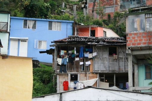 View from above of the multicolored, semi finished favela buildings, scattered on a hill, Favela Rocinha Rio de Janeiro, Brazil.