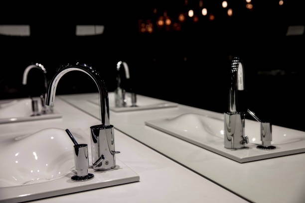 istock Chrome faucet with washbasin and modern black bathroom 903657904