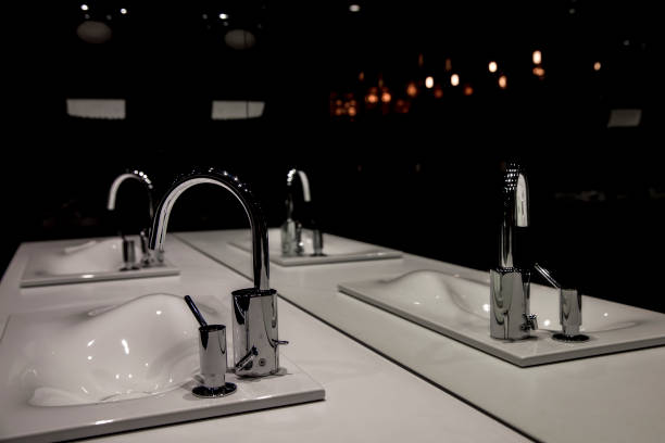 istock Chrome faucet with washbasin and modern black bathroom 903657964