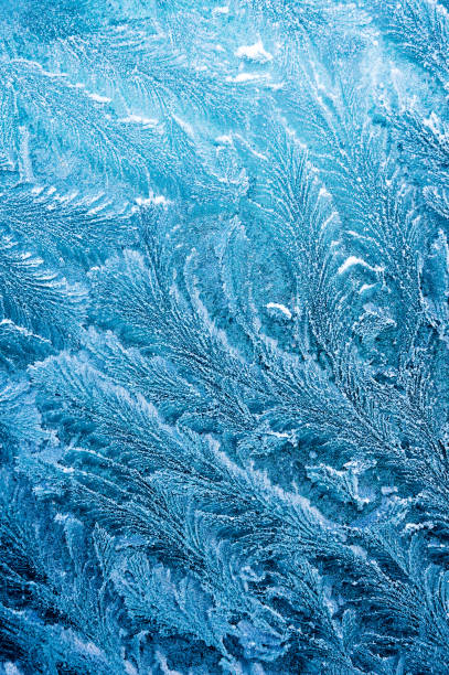 istock The ice-cold frost forms ice crystals in beautiful unique patterns 903658990