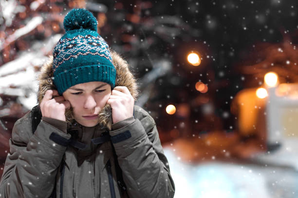 istock serious young man on a city street 903659000