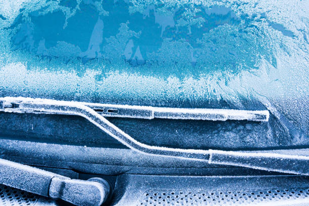 istock The ice-cold frost forms ice crystals in beautiful unique patterns on the Car 903659156