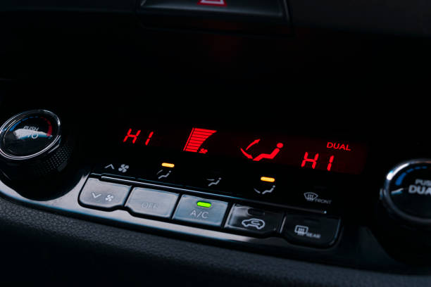 istock Air conditioning button inside a car. Climate control AC unit in the new car. Modern car interior details 903659566