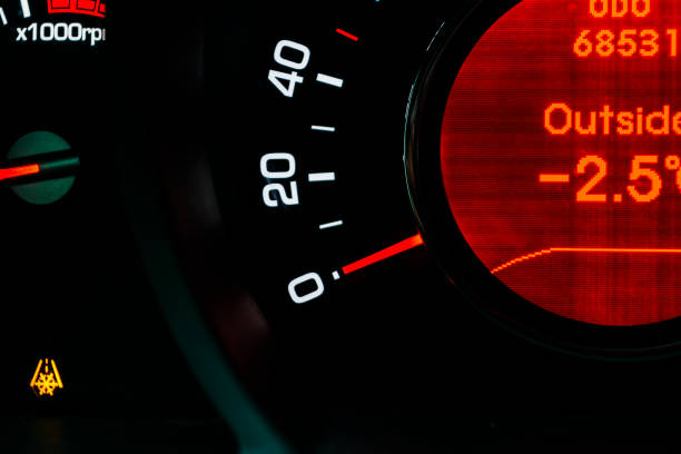 istock Car instrument panel, dashboard closeup with visible speedometer and fuel level. Modern steering wheel. Modern car interior details. odometer, tachometer 903663100