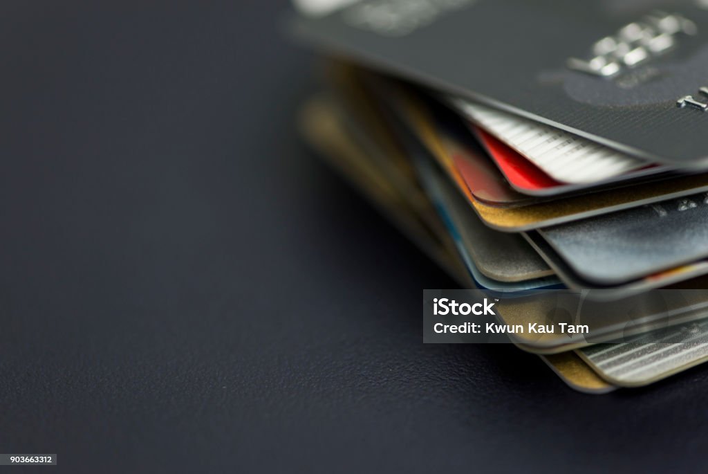 Stack of multicolored credit cards close-up Credit Card Stock Photo