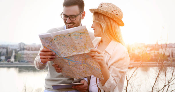 istock Happy tourists traveling and smiling 903663592