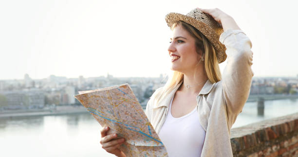 istock Happy blond female traveling and sightseeing 903665880