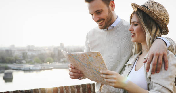 istock Tourist couple exploring city 903666278